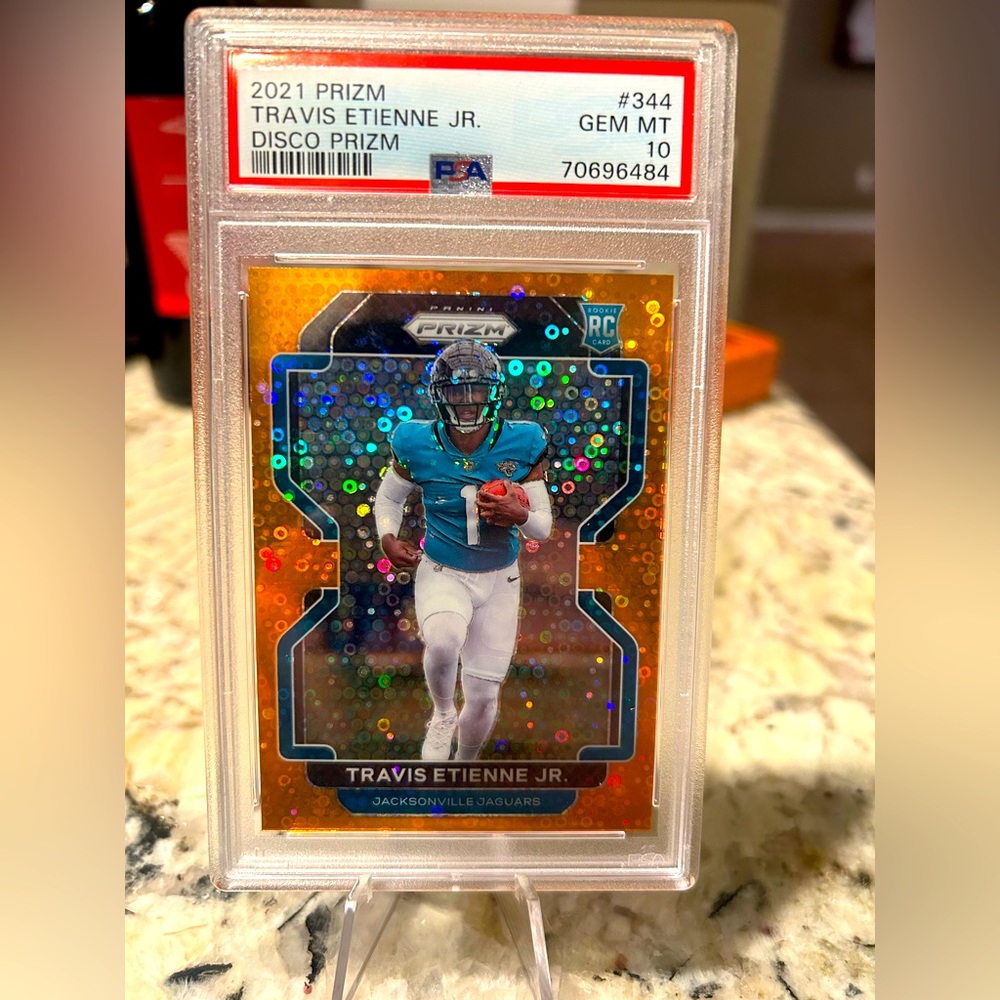 2021 Prizm Travis Etienne Disco PSA 10